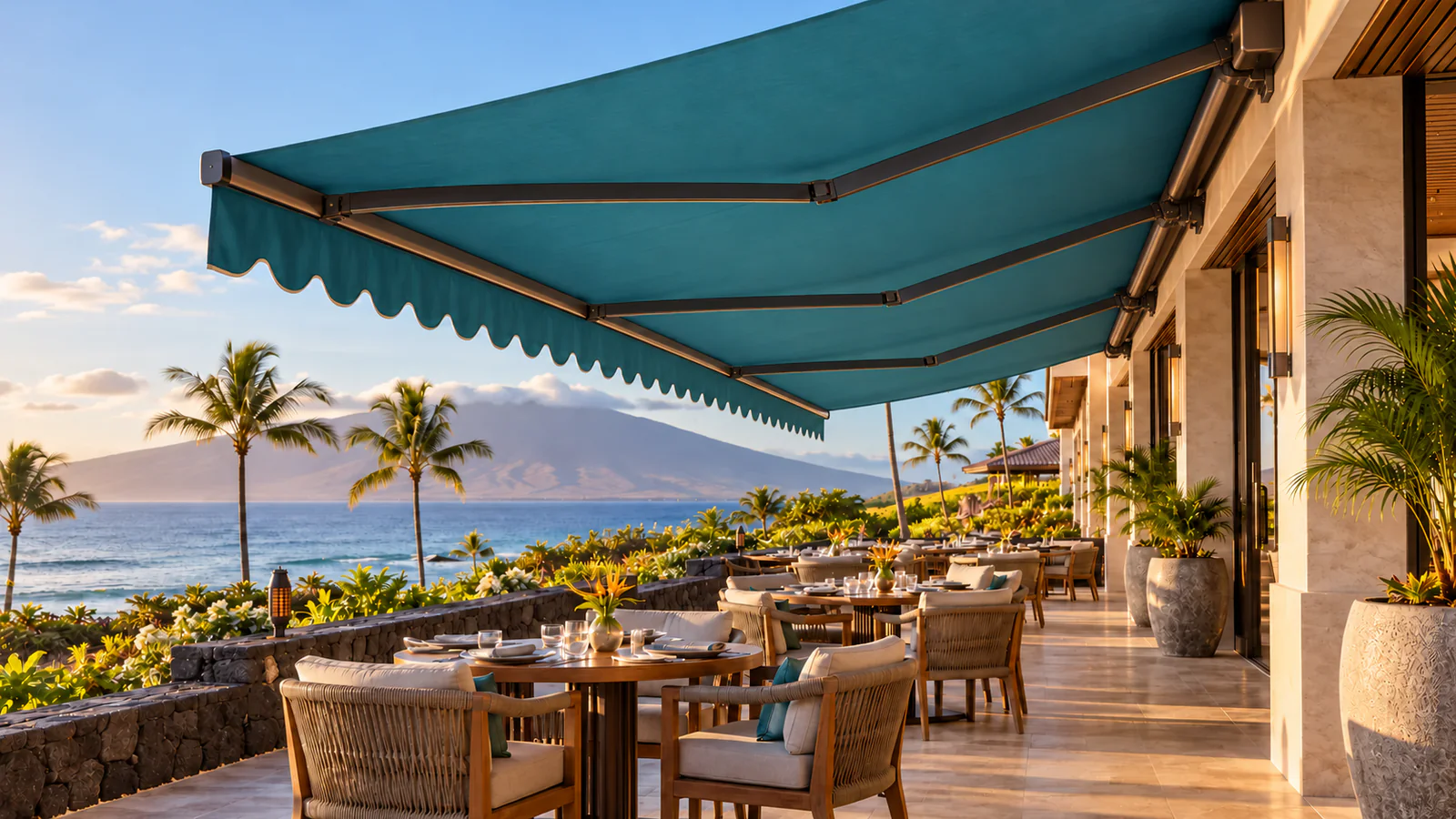 Concept rendering illustrating a teal retractable awning shading an oceanfront resort terrace
